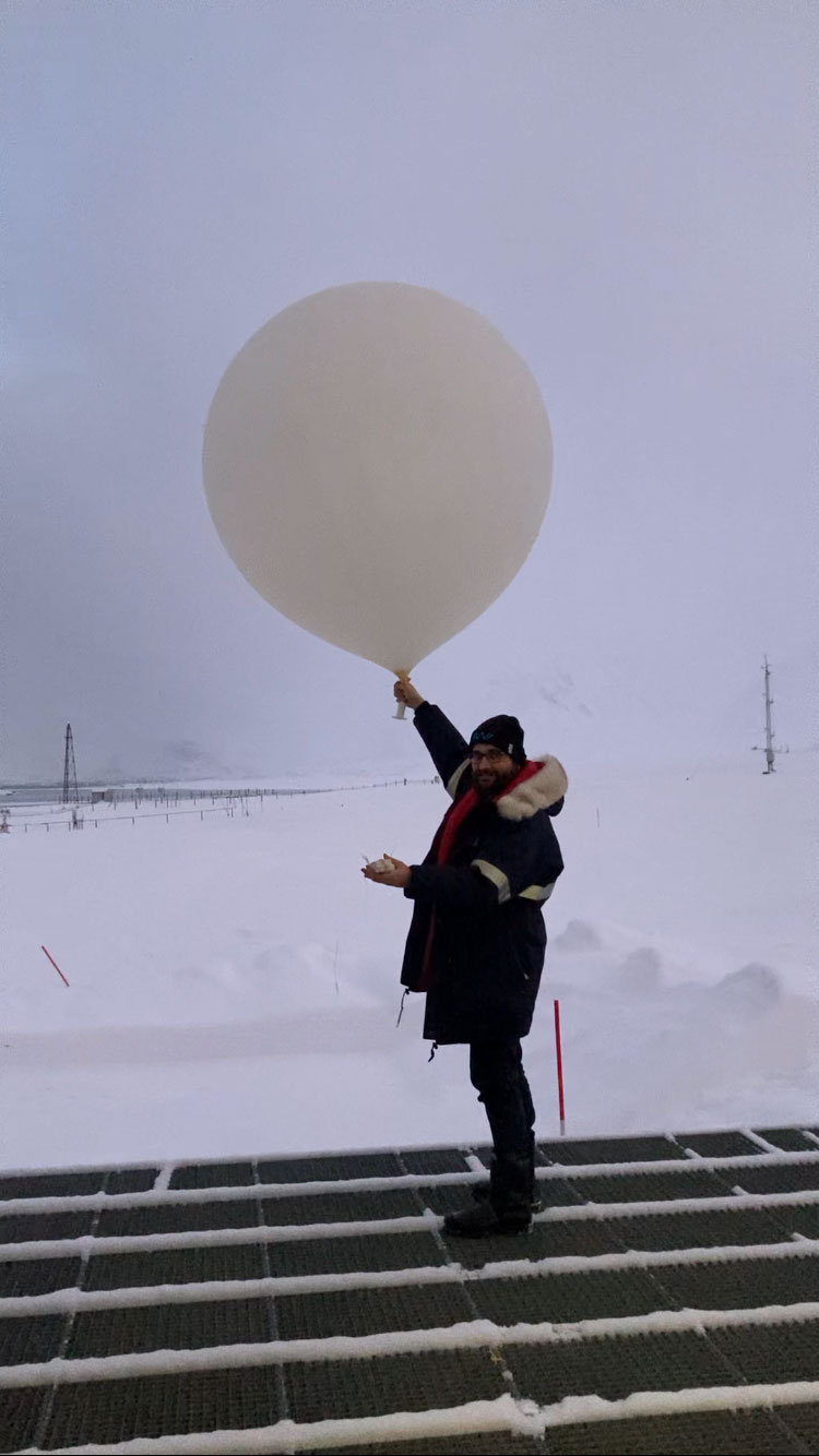 Launching radiosondes from AWIPEV station (photo: Andreas Foth).